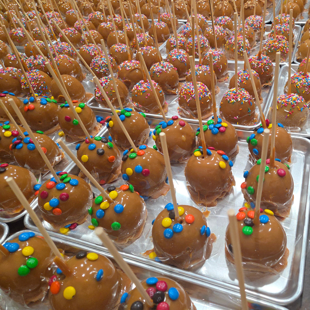 Traditional Caramel Apple covered in colorful M&M's